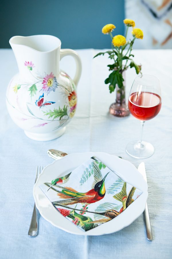 Art of Nature Napkins. The napkins are decorated with a print depicting hummingbirds and greenery.