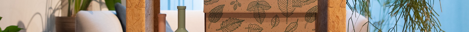The Natural Leaves Storage Box, decorated with drawings of green leaves on plain cardboard.