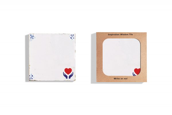 Both an unpackaged and a packaged Care Wisdom Tile depicting to hand holding up a heart.