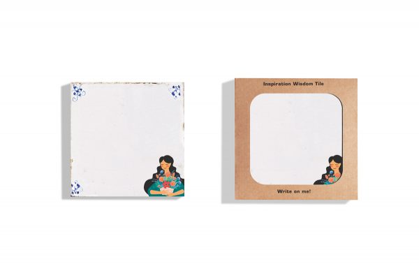 Both a packaged and unpackaged Wonderful Woman Wisdom Tile depicting a woman holding flowers.