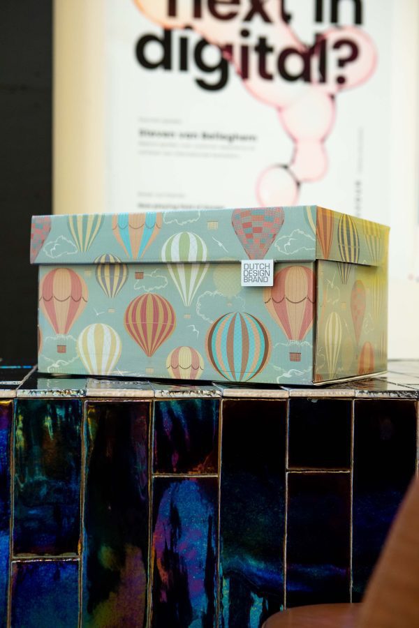 Balloon Sky Storage Box. The box is decorated with several colourful hot air balloons floating in front of a blue backdrop.
