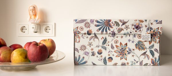 Flower Aquarel Storage Box adorned with a print of colourful hand drawn flowers on a white background.
