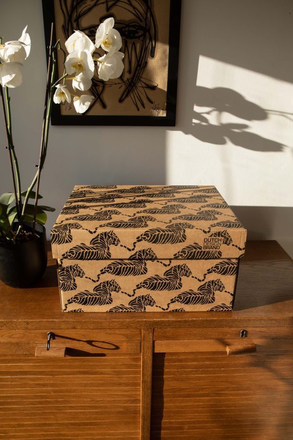 Tiger Tiger Storage Box adorned with a black tiger motif on a plain cardboard background.